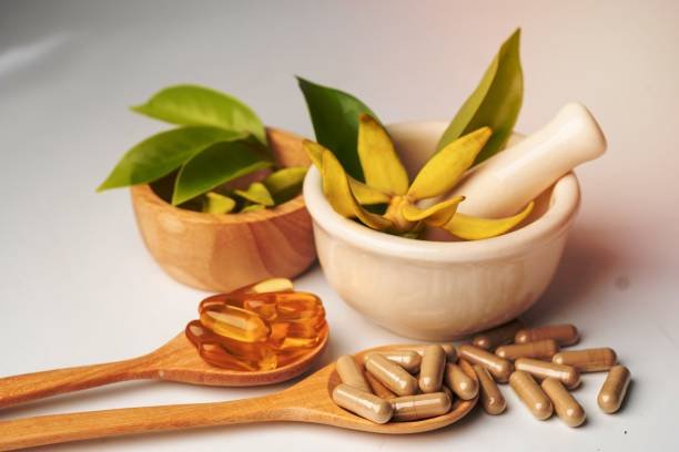 Alternative medicine herbal organic capsule with vitamin E omega 3 fish oil, mineral, drug with herbs leaf natural supplements for healthy good life.